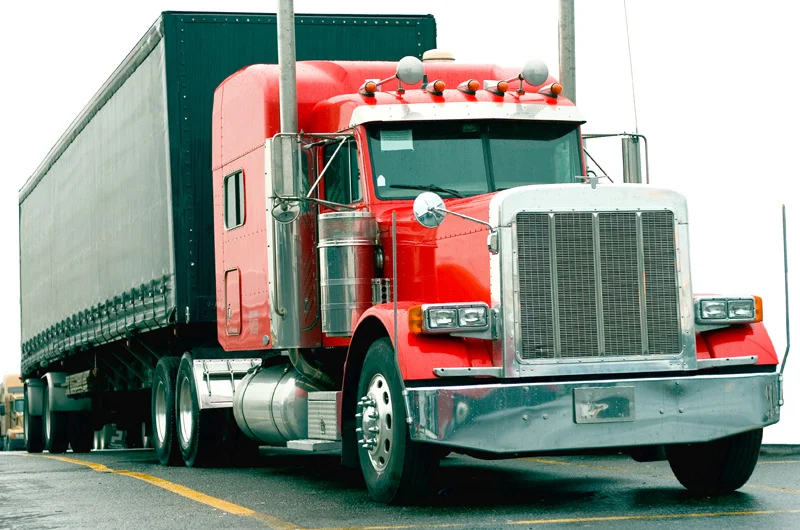 Large red transport truck